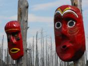 Masks hanging outside the Ouendat village at Huronia Museum.
