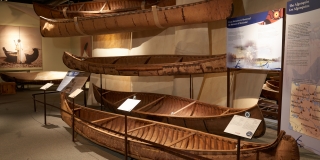 Image of the Origins Gallery with birchbark canoes