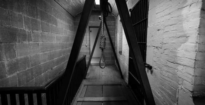 a black and white photo of the gallows showcased on the tour