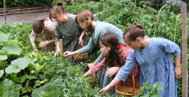 children exploring the garden at Hutchison House