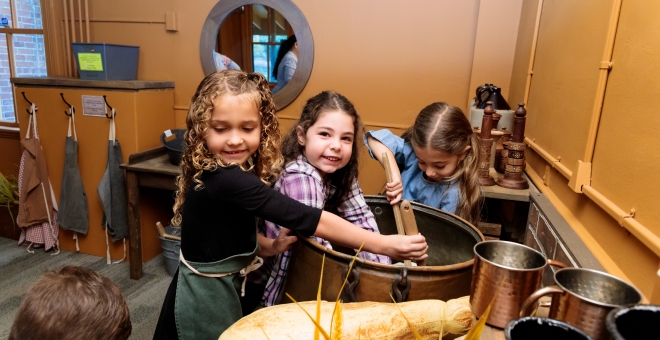Hamilton Children's Museum; kids cooking in kitchen