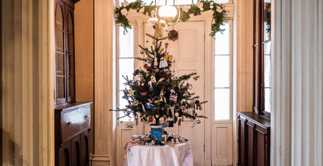 A tree decorated in Victorian Christmas style in the South entrance of Ruthven Park's Thompson Family Mansion
