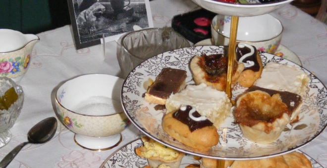 A Mad Hatters Tea Party  afternoon tea tiered plate with refreshments